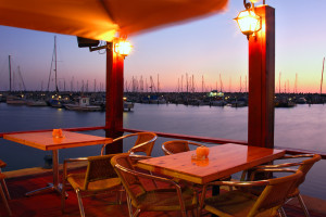 http://www.dreamstime.com/royalty-free-stock-image-outdoor-restaurant-marina-evening-image13002906